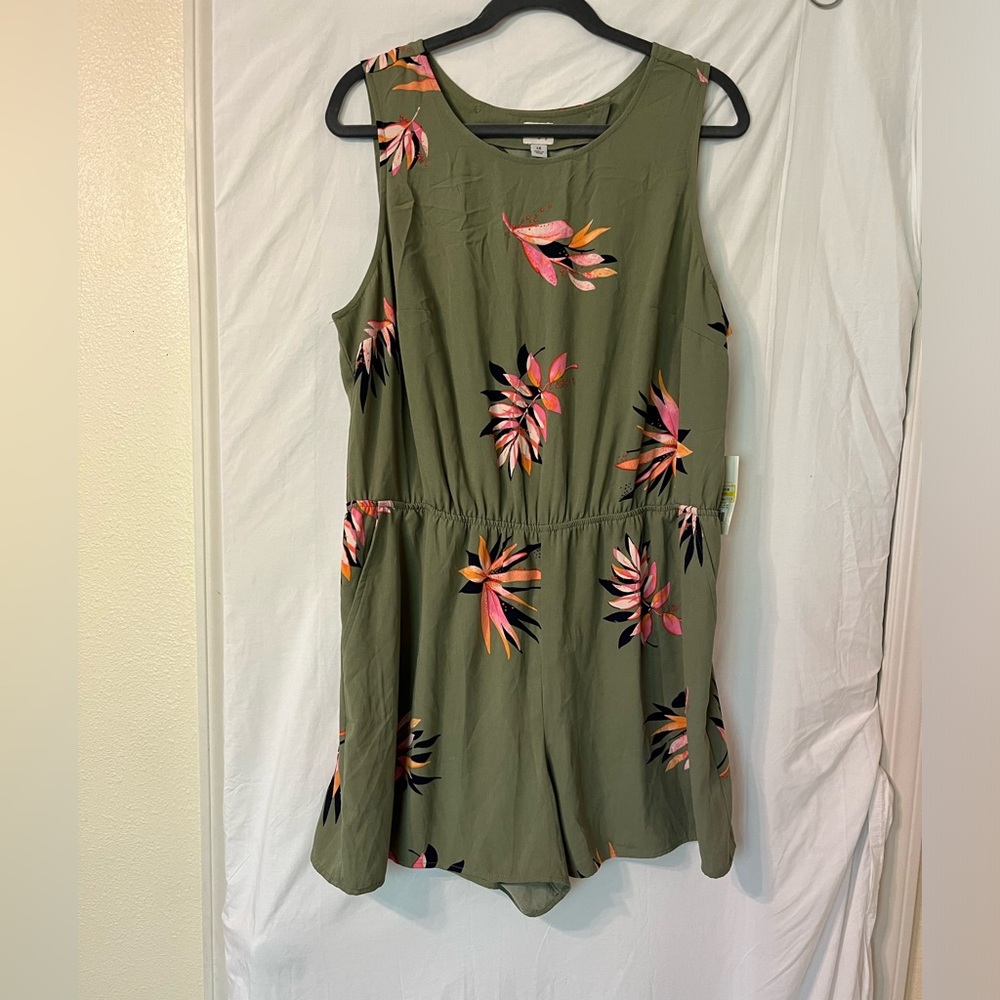A New Day romper with pockets.